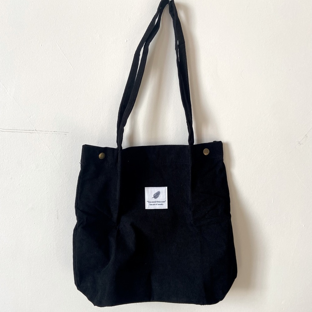 new in packaging black corduroy ‘you need this one, take care of laundry…
